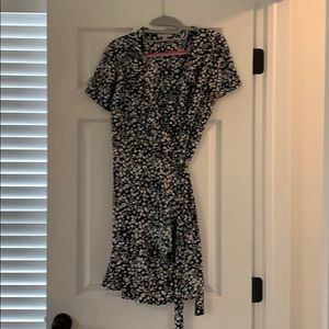 Wrap dress with ruffled neck line